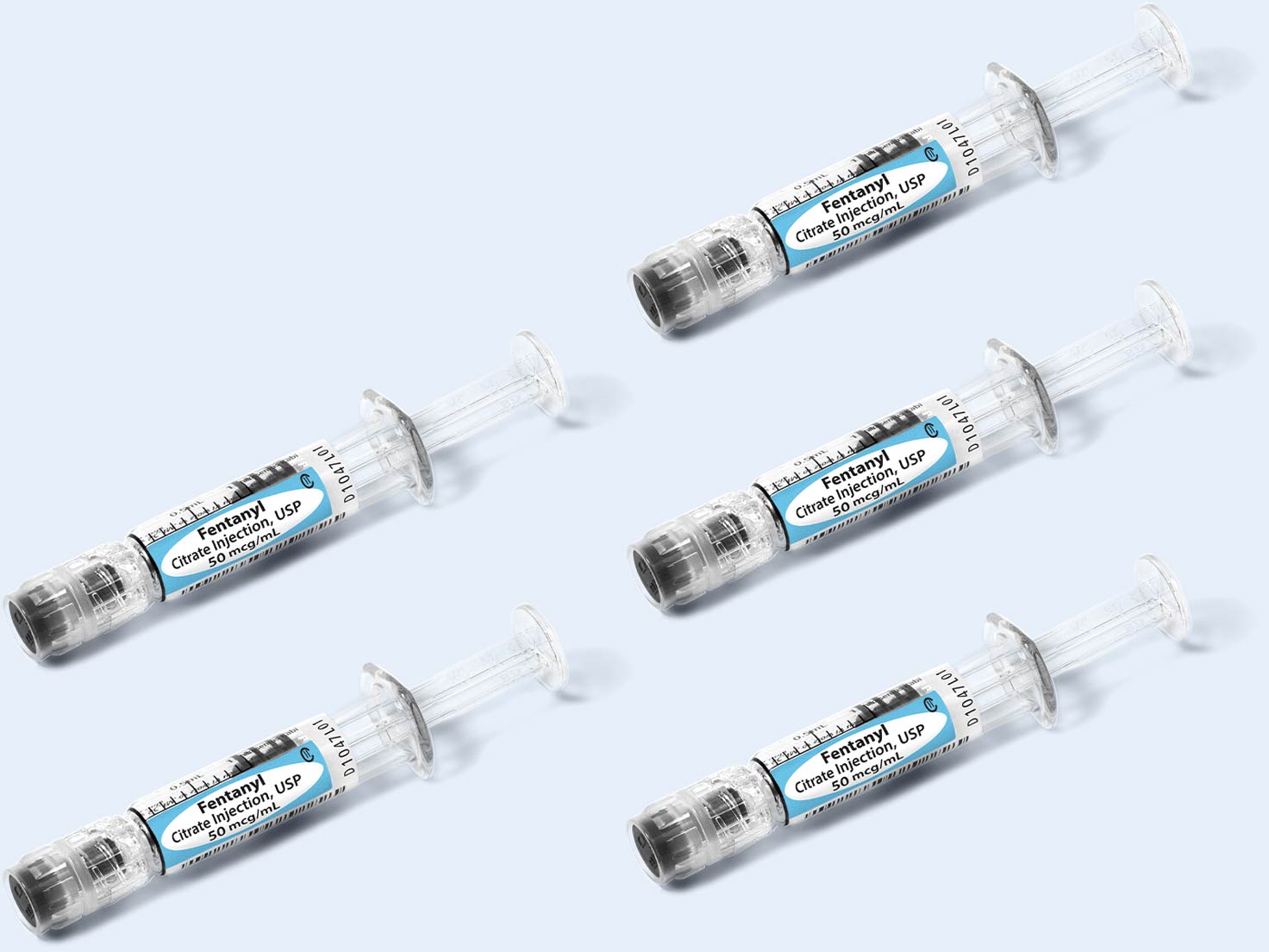 Five syringes on a blue field
