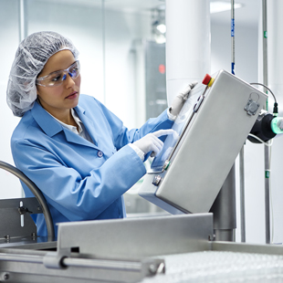 Fresenius Kabi technician operating state-of-the-art manufacturing plant